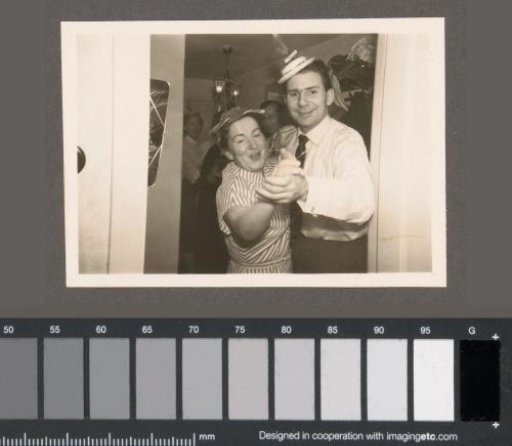 Dancing man and woman at a party