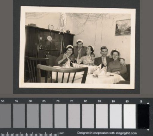 Men and Women at a Table at a Feast
