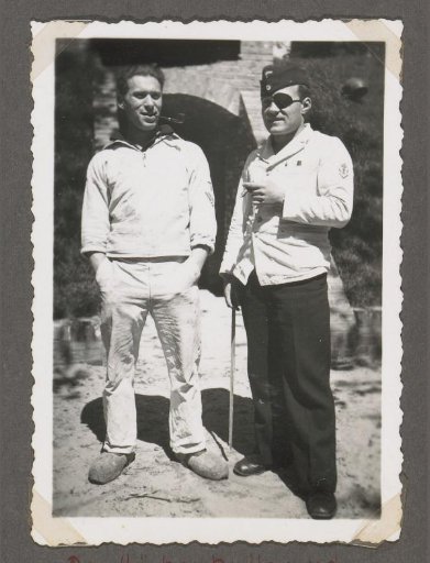 Portrait of a kitchen worker and a man in uniform