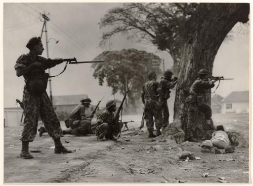 Dutch Soldiers Respond to Gunfire from a Sniper in Malang, Java