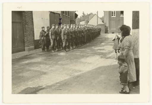 Group of German Wehrmacht Soldiers in a Village