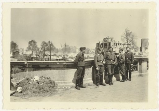 German soldiers near destroyed houses