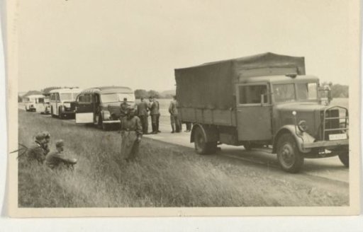 German soldiers by a truck
