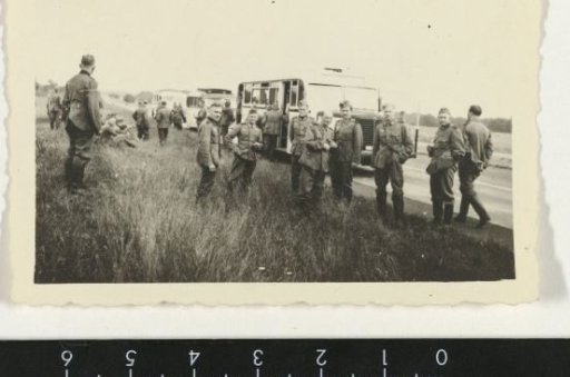 German soldiers by buses