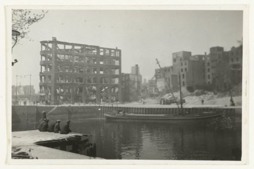 Burnt houses along the water