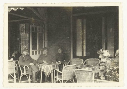 Three German soldiers on a terrace