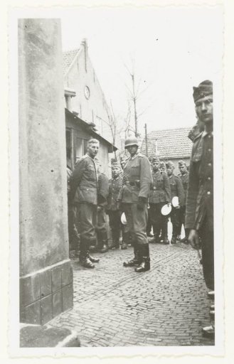 Wehrmacht soldiers at the field kitchen