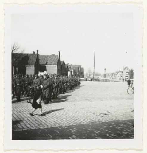 Column of German soldiers with bicycles