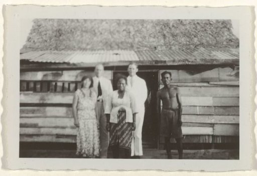 Three European Men posing with a Javanese-Surinamese Couple