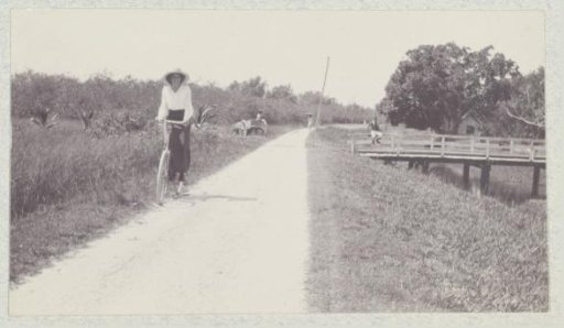 Maria Gonggrijp on a bicycle
