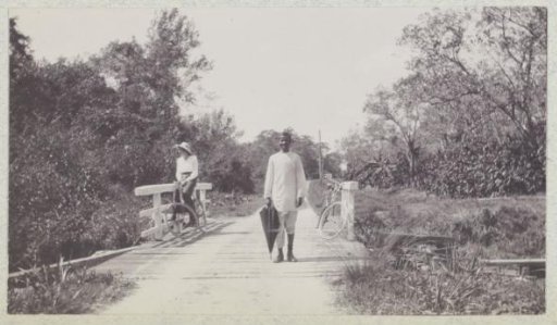 Hindustani man with an umbrella