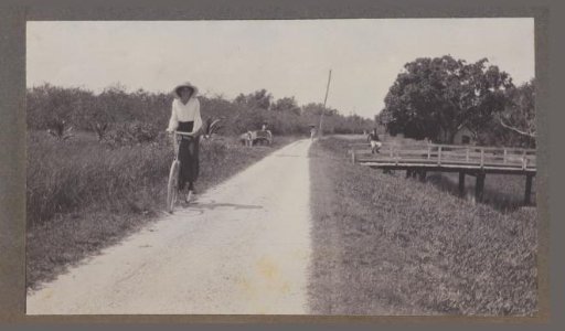 Maria Gonggrijp on a bicycle
