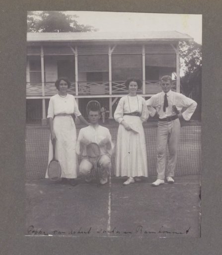 Group photo of four people at the tennis club