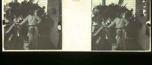 Father and son on a veranda in Paramaribo