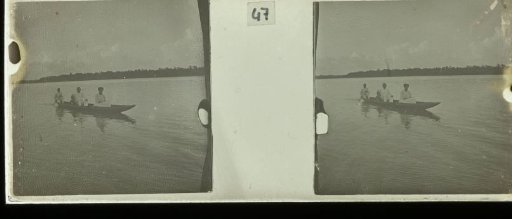 Theodoor and Lize Brouwers with their son Gerard in a coracle on the Suriname River.