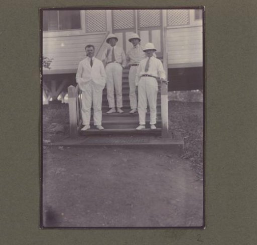 Photograph of four men