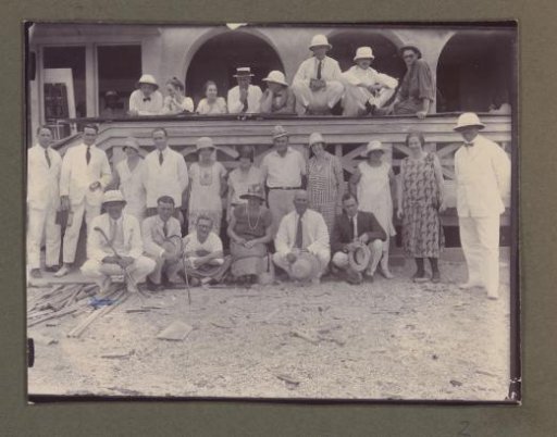 Group photograph in front of a house