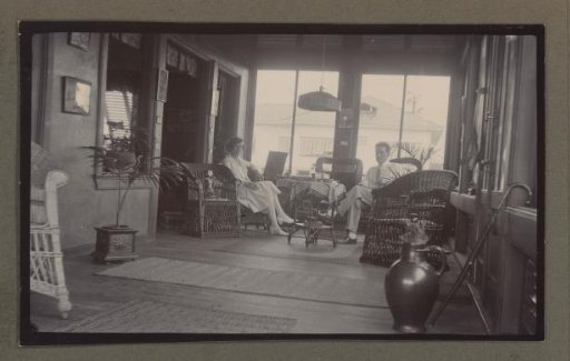 Man and woman sitting in a living room