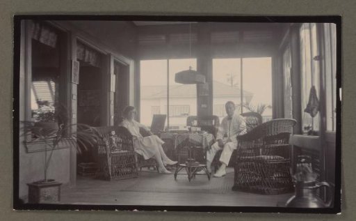 Man and woman sitting in a living room