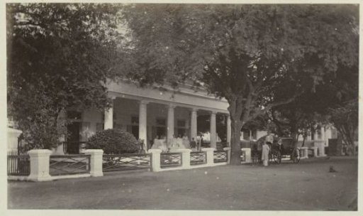 Women Outside a House