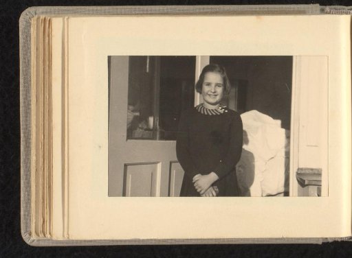 Isabel Wachenheimer before the balcony door of the Wachenheimer family home, June-August 1937, Stuttgart