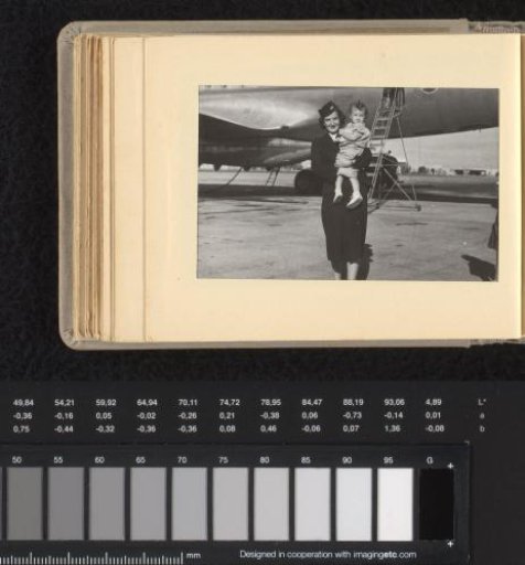 Isabel Wachenheimer as a KLM stewardess standing in front of an airplane with a girl in her arms, 1947-1955, Israel