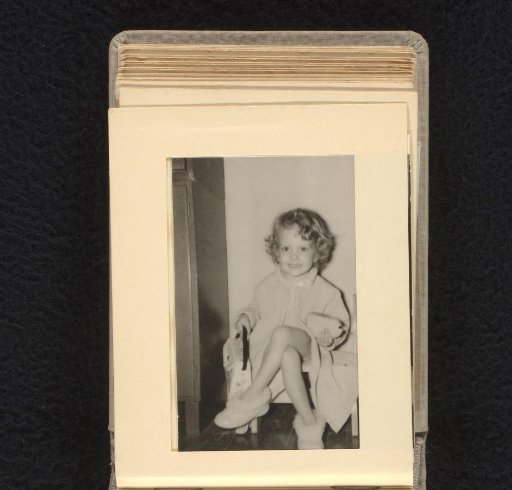 Unknown girl sitting on a chair, 1956-1970?, United States?