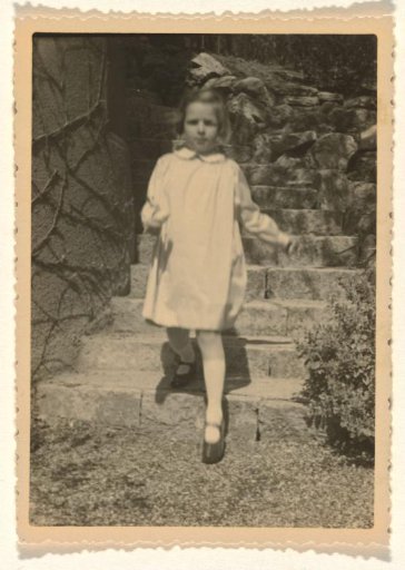 Isabel Wachenheimer outdoors by a stone staircase, in Stuttgart, April-May 1935
