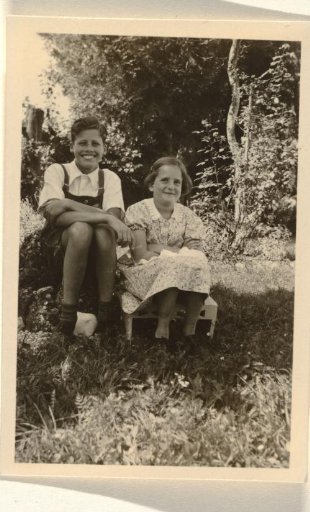 Isabel Wachenheimer and Walter seated in a forest near Krün, August 1936