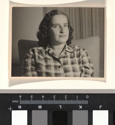 Isabel Wachenheimer in a Checked Shirt Sitting on the Sofa in Israel, 1949-1955