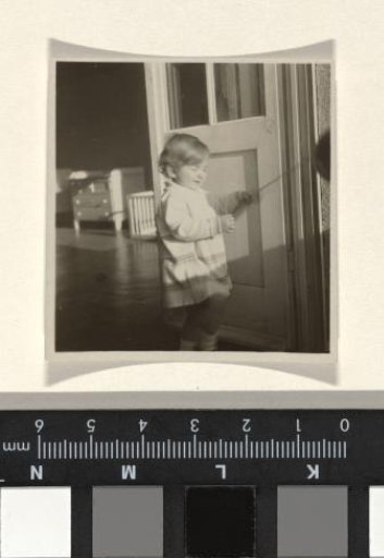 Isabel Wachenheimer in the doorway of a balcony, January 1930
