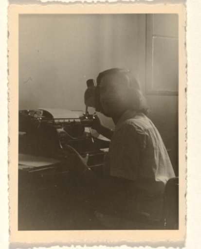 Isabel Wachenheimer seated behind a typewriter