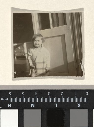 Isabel Wachenheimer in the doorway of a balcony, January 1930