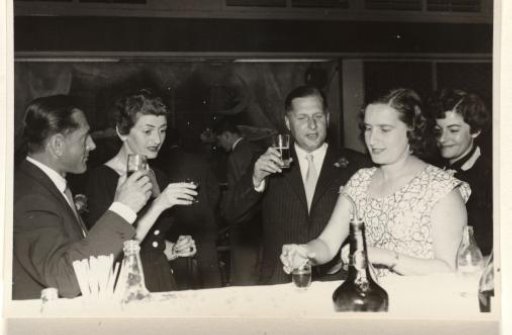 Gideon Elon in conversation with two unknown men, during a reception during Isabel Wachenheimer's time with KLM