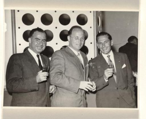 Gideon Elon with two unknown men, during a reception during Isabel Wachenheimer's time with KLM