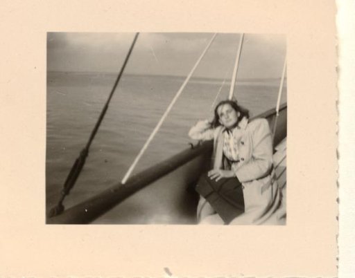 Isabel Wachenheimer on a boat, leaning on the railing