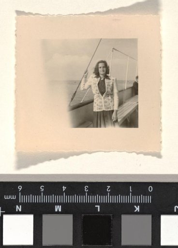 Isabel Wachenheimer standing on a boat