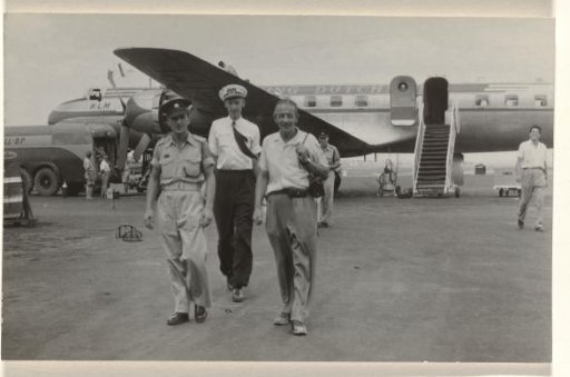 Members of an aircraft crew walking on a runway in front of a KLM aircraft The Flying Dutchman