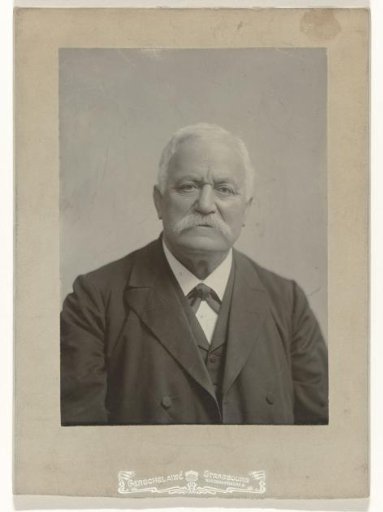 Portrait of an older man with a moustache, in dark clothing