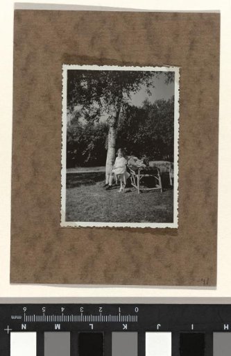 Isabel Wachenheimer in a garden, with an unknown child