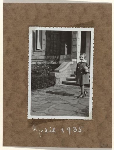 Isabel Wachenheimer with a ball in front of her uncle Willy Moos's house in Hamburg, Bellevue 62, April 1935
