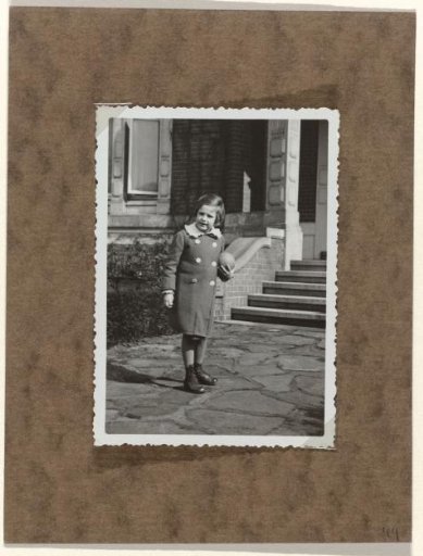 Isabel Wachenheimer with a ball in front of her uncle Willy Moos's house in Hamburg, Bellevue 62