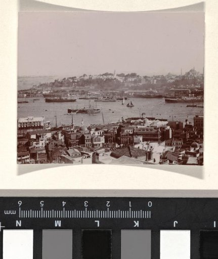 Istanbul with two banks of the Bosphorus river and ships on the river