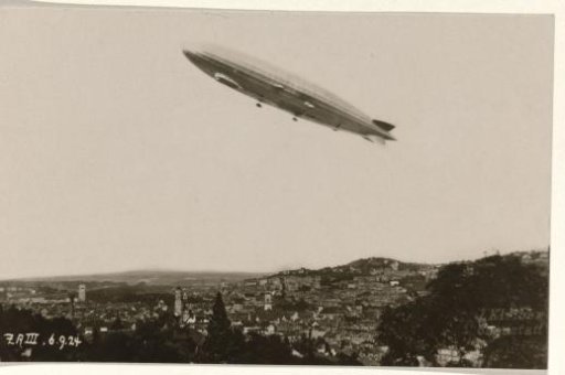 Flying zeppelin above a city