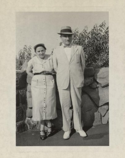 Aunt Rosel and Uncle Julius Standing in Front of a Stone Wall