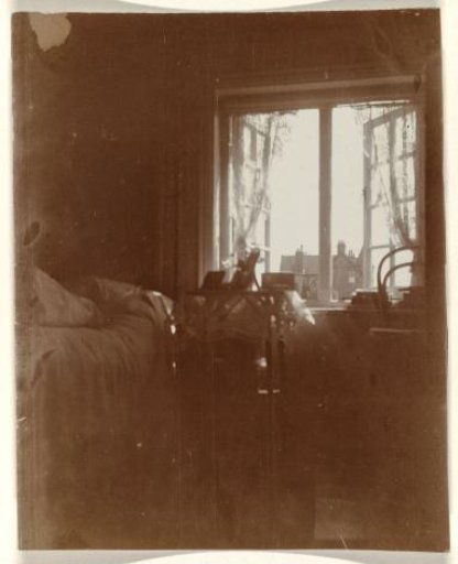 Room, with Bed, Table with Attributes Placed on It and Open Windows with Curtains