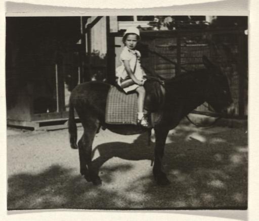 Isabel Wachenheimer on a donkey during a holiday near the Eibsee in August 1932