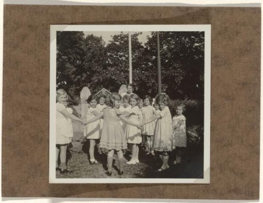 Isabel Wachenheimer with Unknown Children at a Children's Party in a Garden