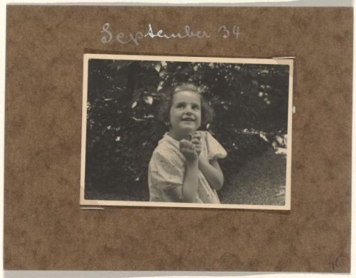 Isabel Wachenheimer in a garden during a visit to her uncle Willy Moos in Hamburg, September 1934