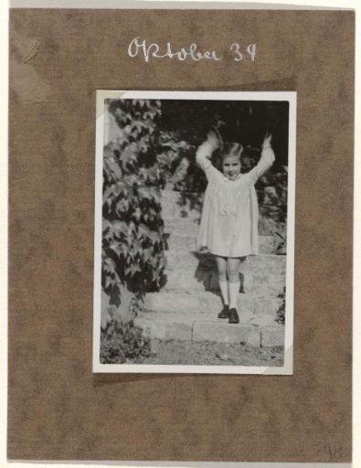 Isabel Wachenheimer outdoors by a stone staircase, in Stuttgart, October 1934